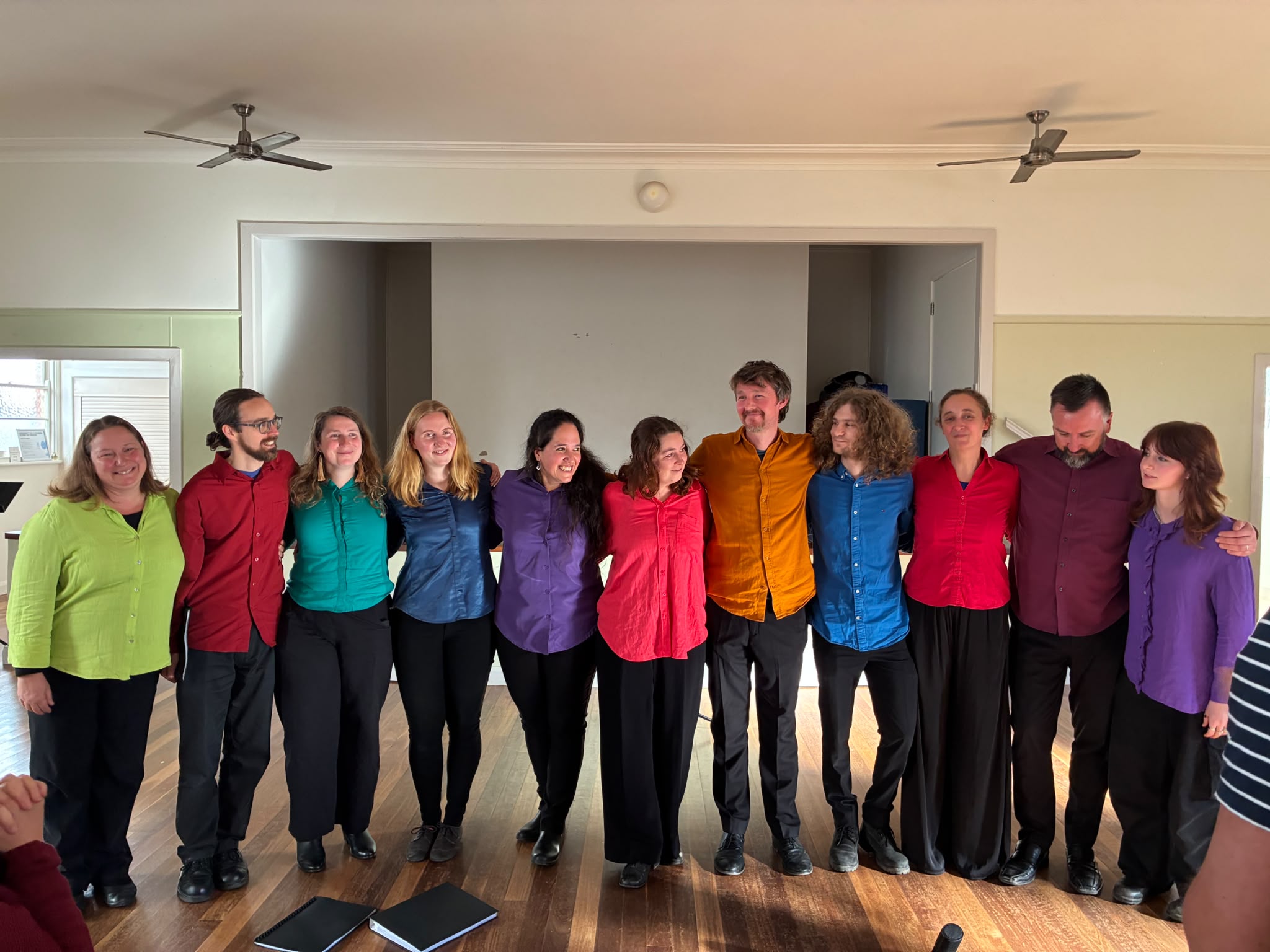 The group singing together after a workshop